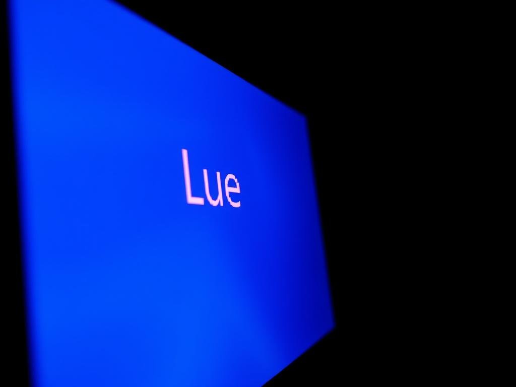 a vibrant blue screen with a prominent error code prominently displayed, capturing the essence of a critical system failure. the digital interface is captured in crisp detail, with a slightly angled perspective to create a sense of urgency. subtle lighting from the screen casts a cool, eerie glow, setting an unsettling tone. the background fades into a dark, ominous void, heightening the viewer's focus on the troubling error message. this visually striking image conveys the gravity of a blue screen error, underscoring the need for troubleshooting and repair.